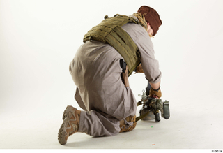 Photos Luis Donovan Army Taliban Gunner Poses charging gun kneeling…